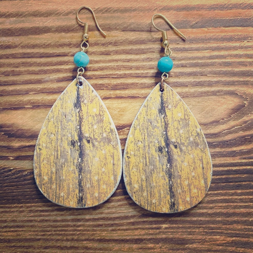 Handmade paper distressed wood earrings.
